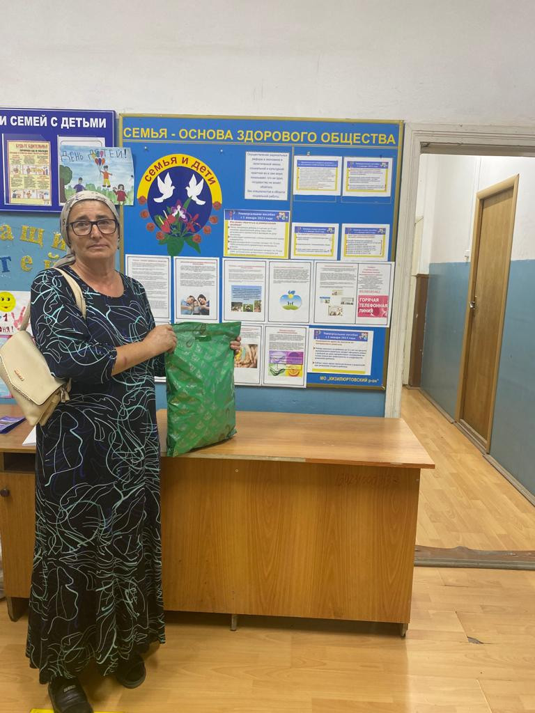 Оказание материальной помощи (в виде одежды)многодетной семье с.Чонтаул