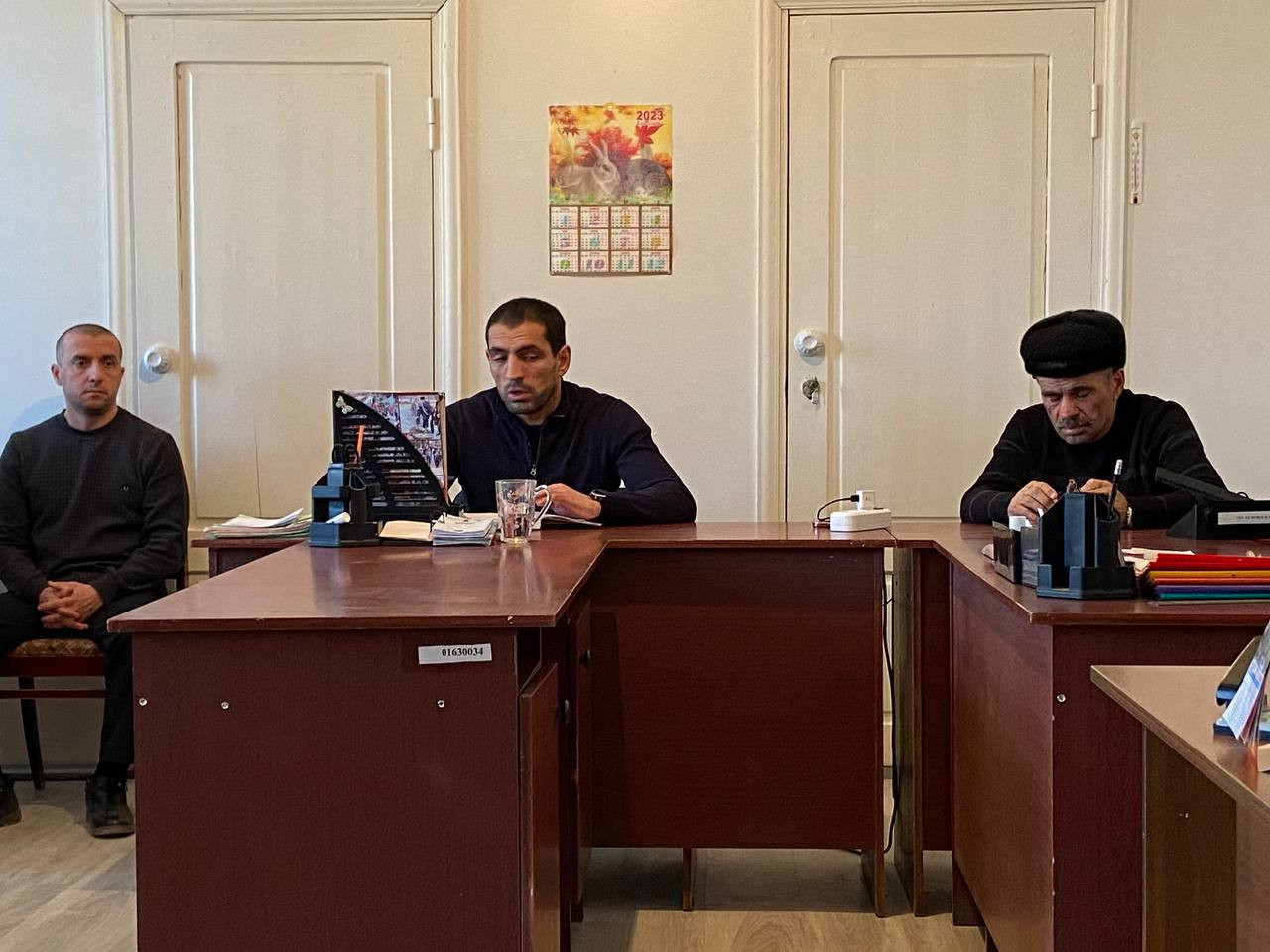 Совещание работников.