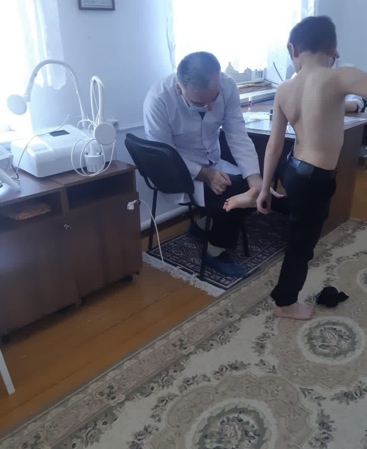 "Осмотр ортопеда при диагнозе "Плоскостопие"