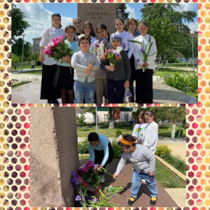 Возложение цветов подопечными детьми к памятнику "Гомера XX" века Сулеймана Стальского